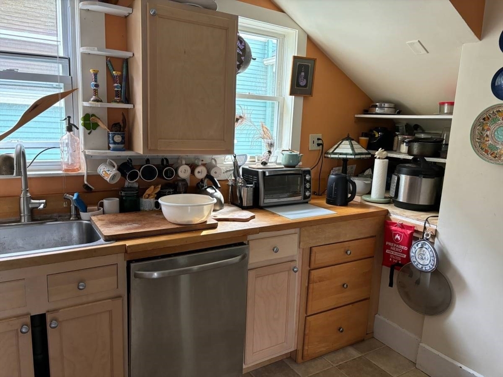 21 Conway Street, Unit 2 Boston, MA 02131 - Photo 6 of 12 a kitchen with a sink and cabinets