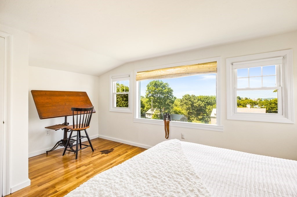 29 Governor Long Road Hingham, MA 02043 - Photo 15 of 39 a bedroom with a bed and a window