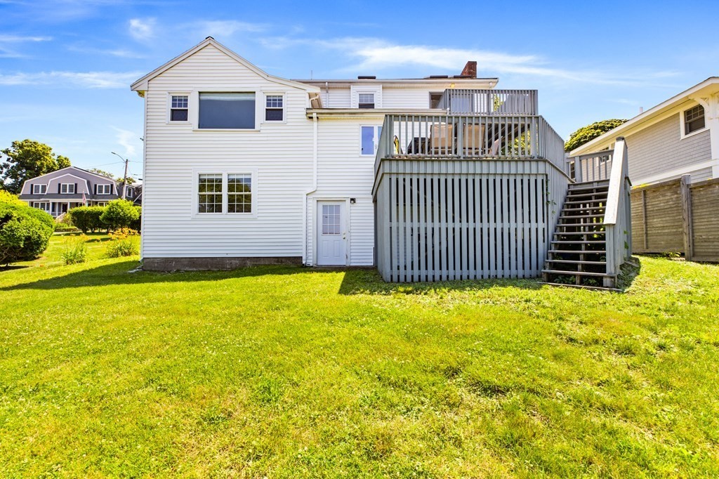 29 Governor Long Road Hingham, MA 02043 - Photo 18 of 39 a front view of a house with a yard