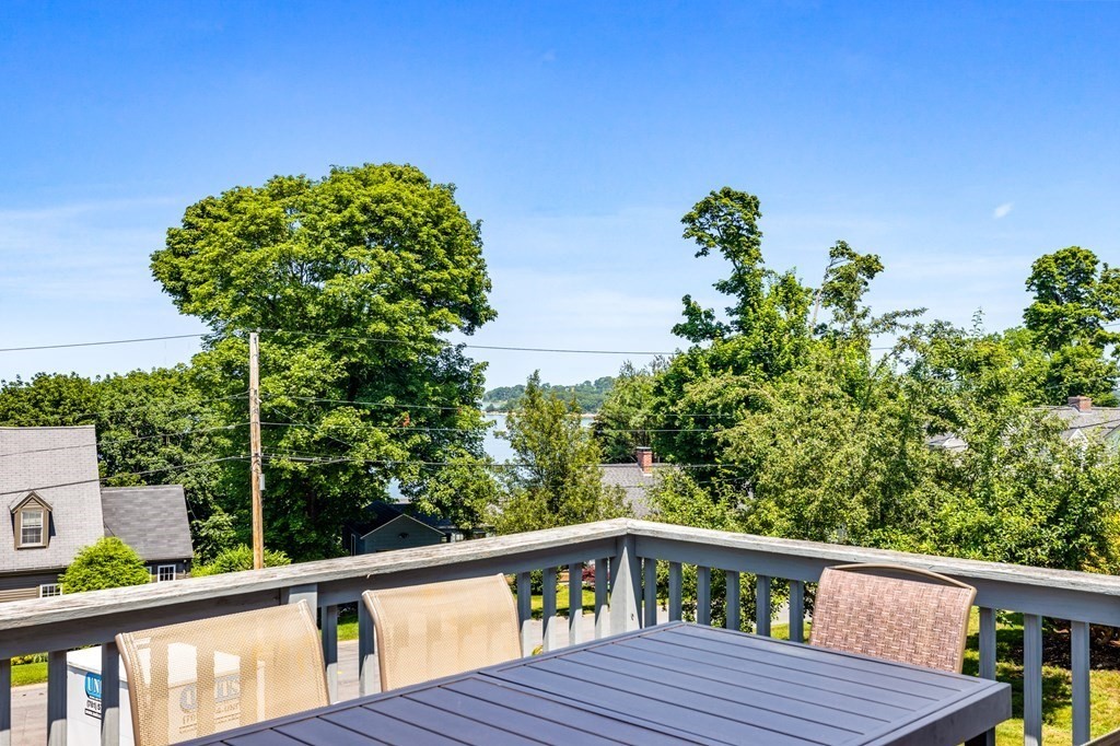 29 Governor Long Road Hingham, MA 02043 - Photo 8 of 39 a view of a balcony with wooden floor