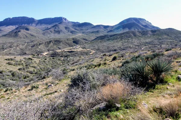 a view of mountains and valleys