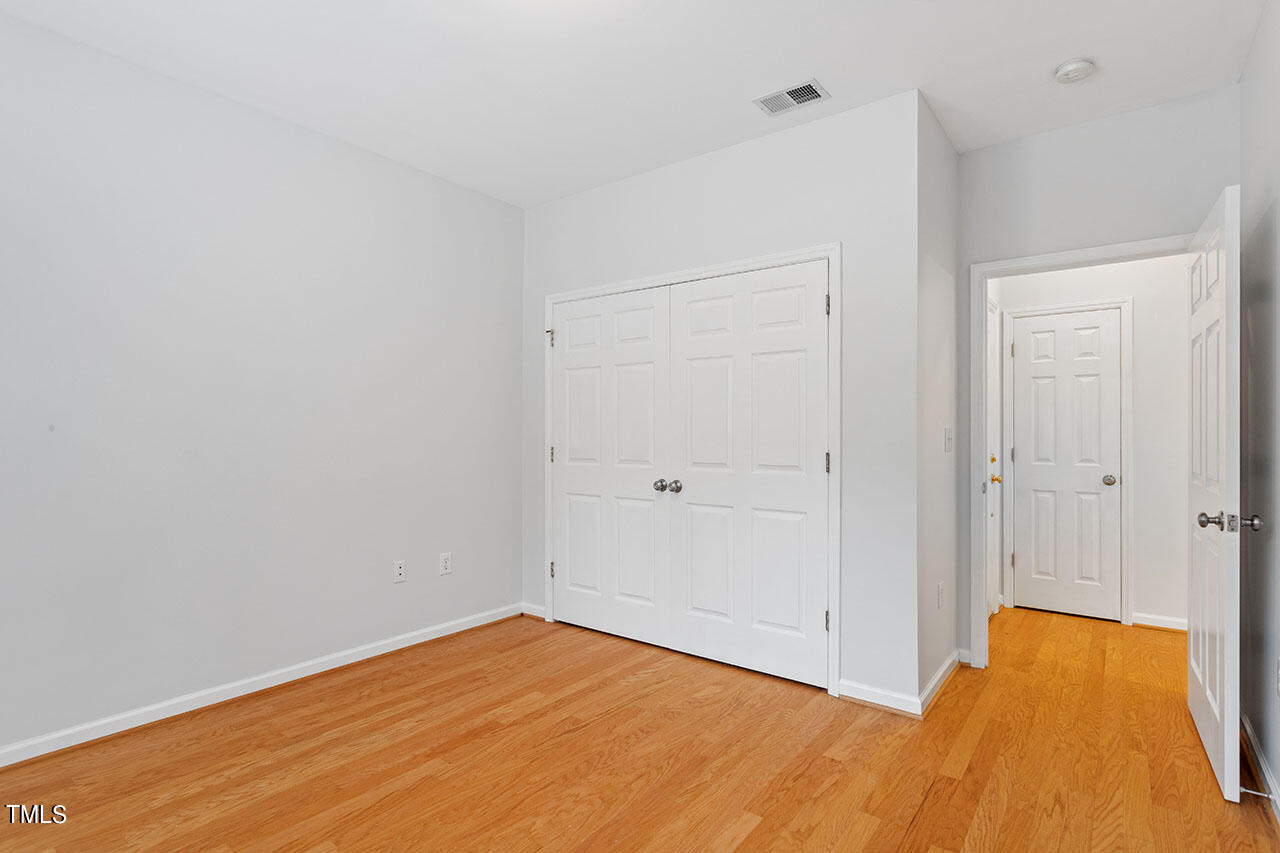 800 Moratuck Drive, Unit 102 Raleigh, NC 27604 - Photo 26 of 36 a view of an empty room