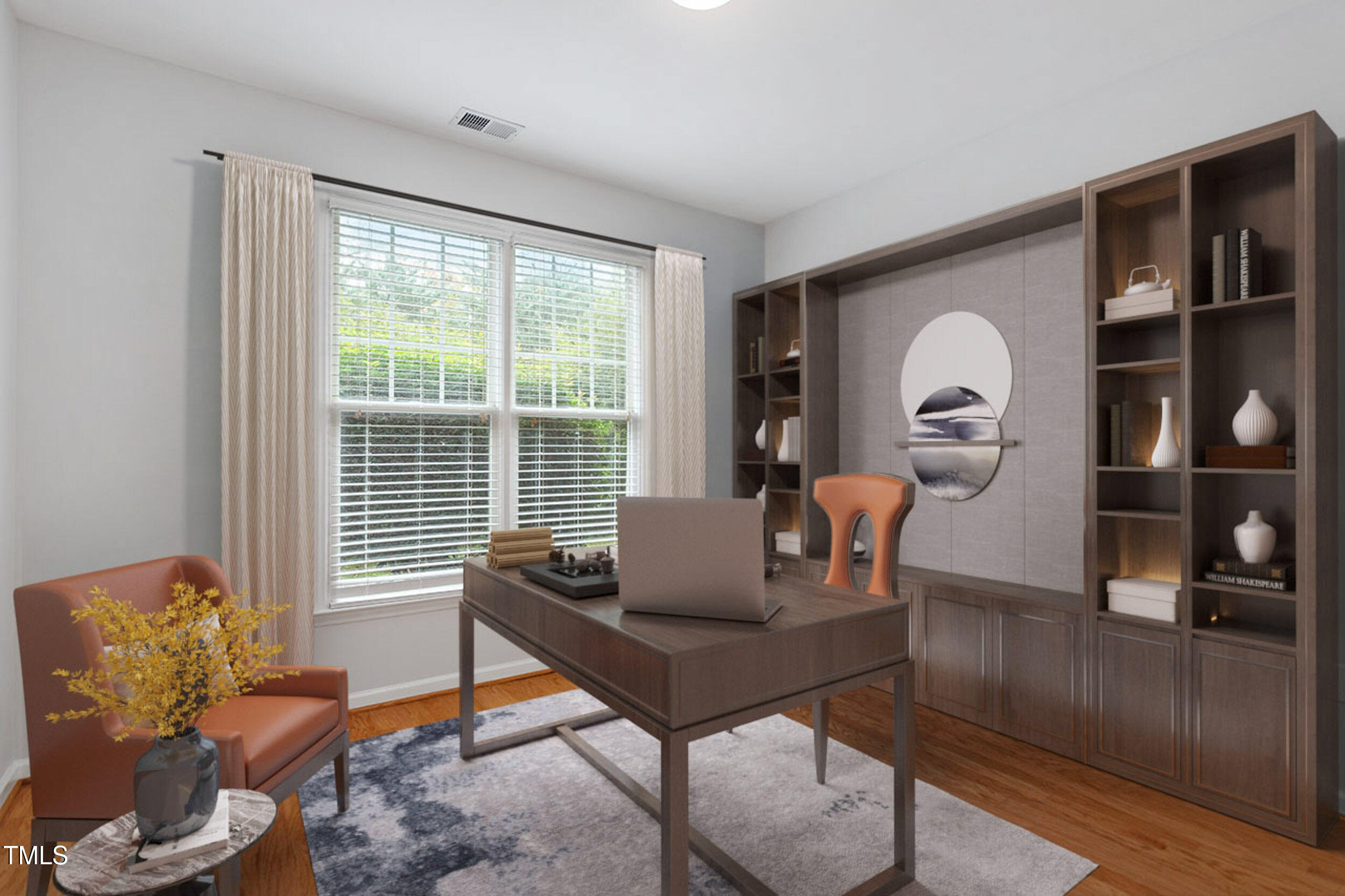 800 Moratuck Drive, Unit 102 Raleigh, NC 27604 - Photo 28 of 36 a living room with furniture and a window