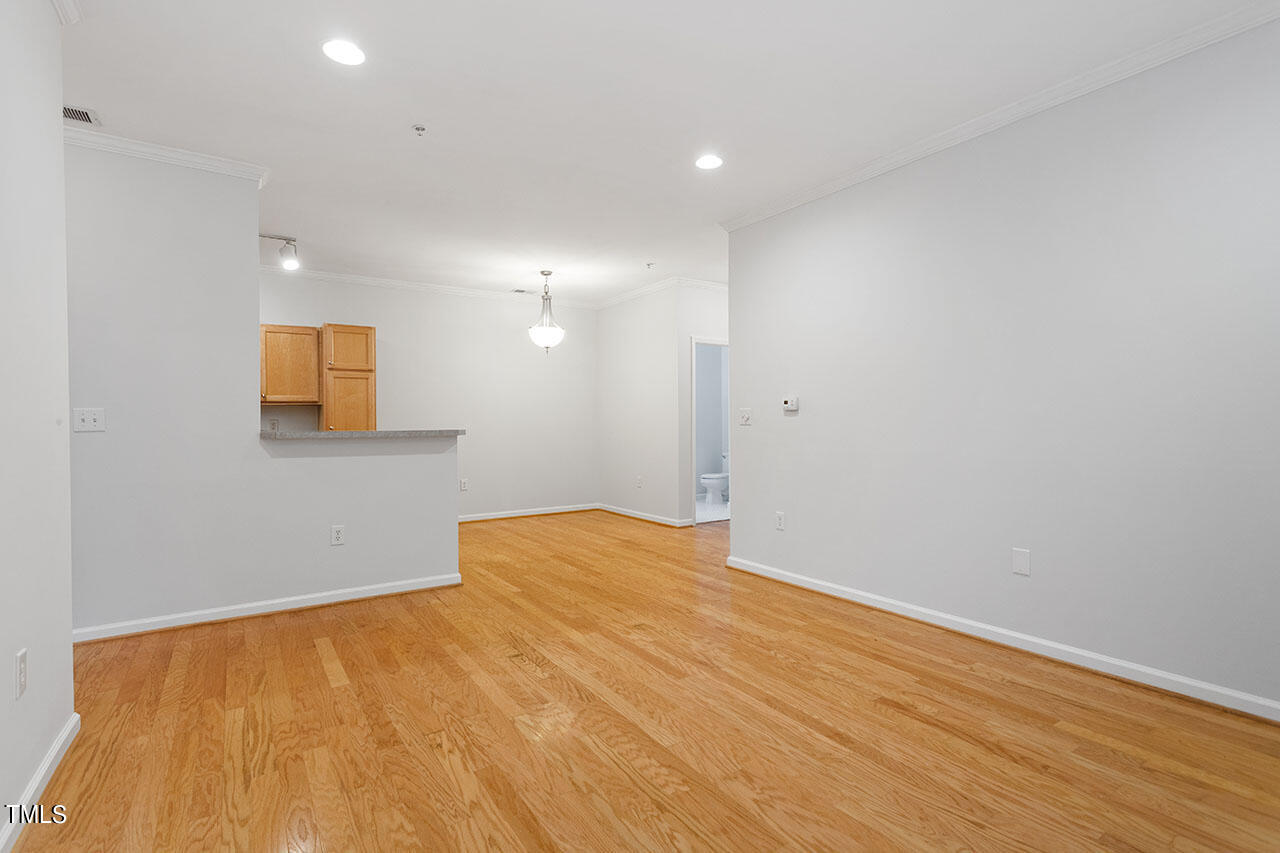 800 Moratuck Drive, Unit 102 Raleigh, NC 27604 - Photo 6 of 36 a view of an empty room