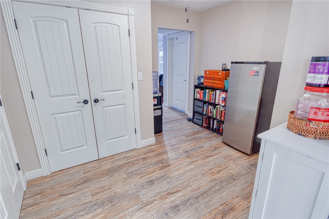 1202 Crosby Street Portland, TX 78374 - Photo 11 of 20 a view of a room with wooden floor