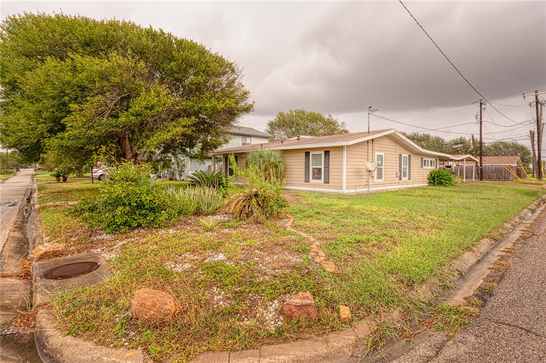 1202 Crosby Street Portland, TX 78374 - Photo 3 of 20 a view of a house with a yard