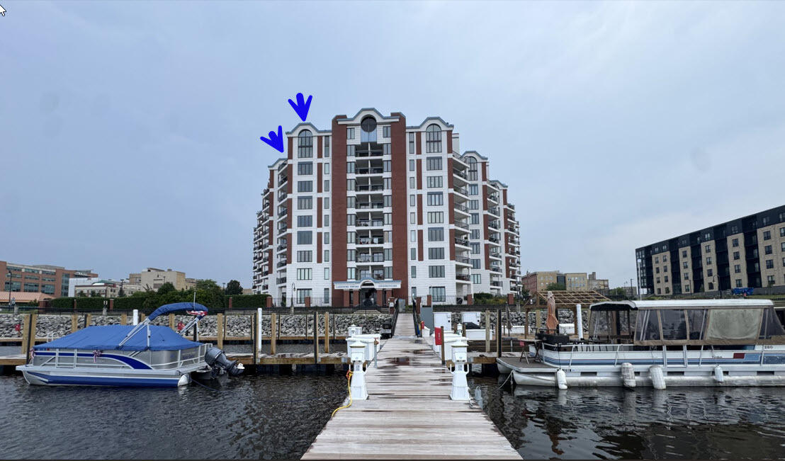 333 Lake Avenue, Unit 806 Racine, WI 53403 - Photo 2 of 56 1B_LST Building Marina View with Arrow o