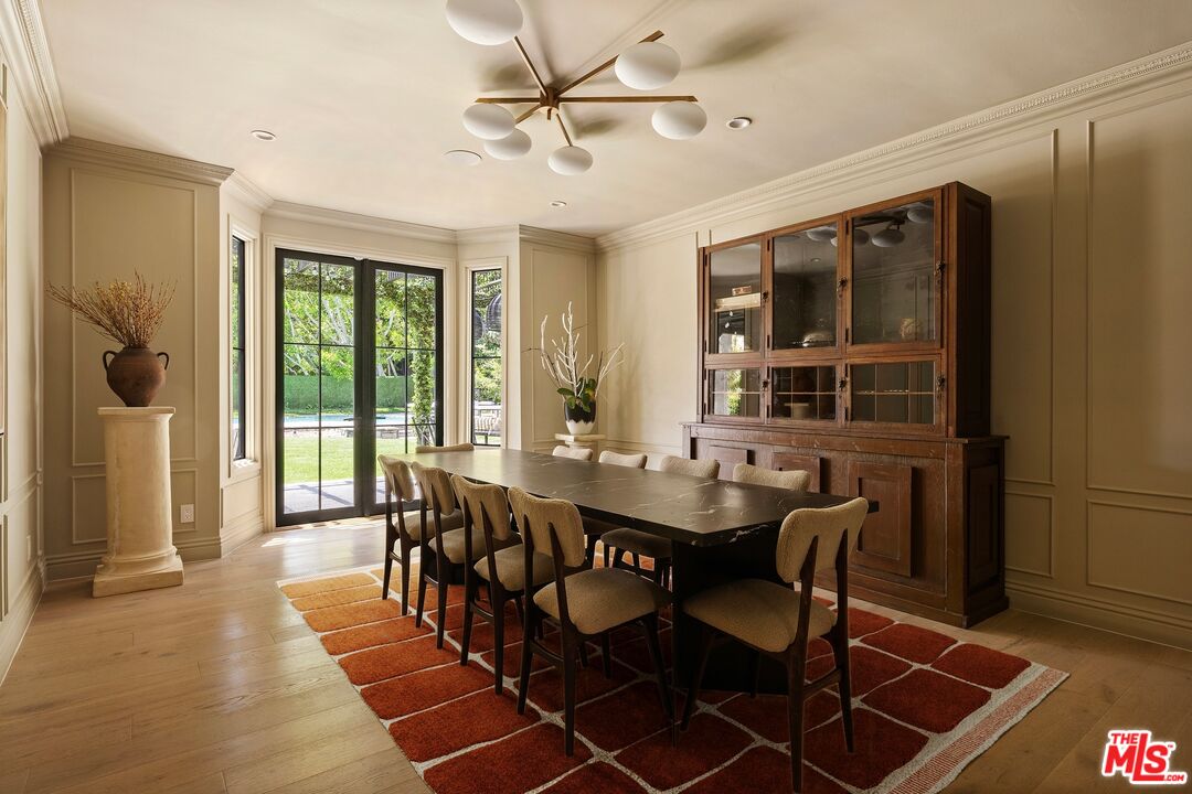 9872 Whitwell Drive Beverly Hills, CA 90210 - Photo 11 of 32 a view of a dining room with furniture and window