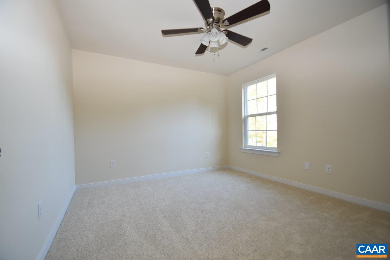87 Riva Way Palmyra, VA 22963 - Photo 13 of 19 an empty room with a window and a fan