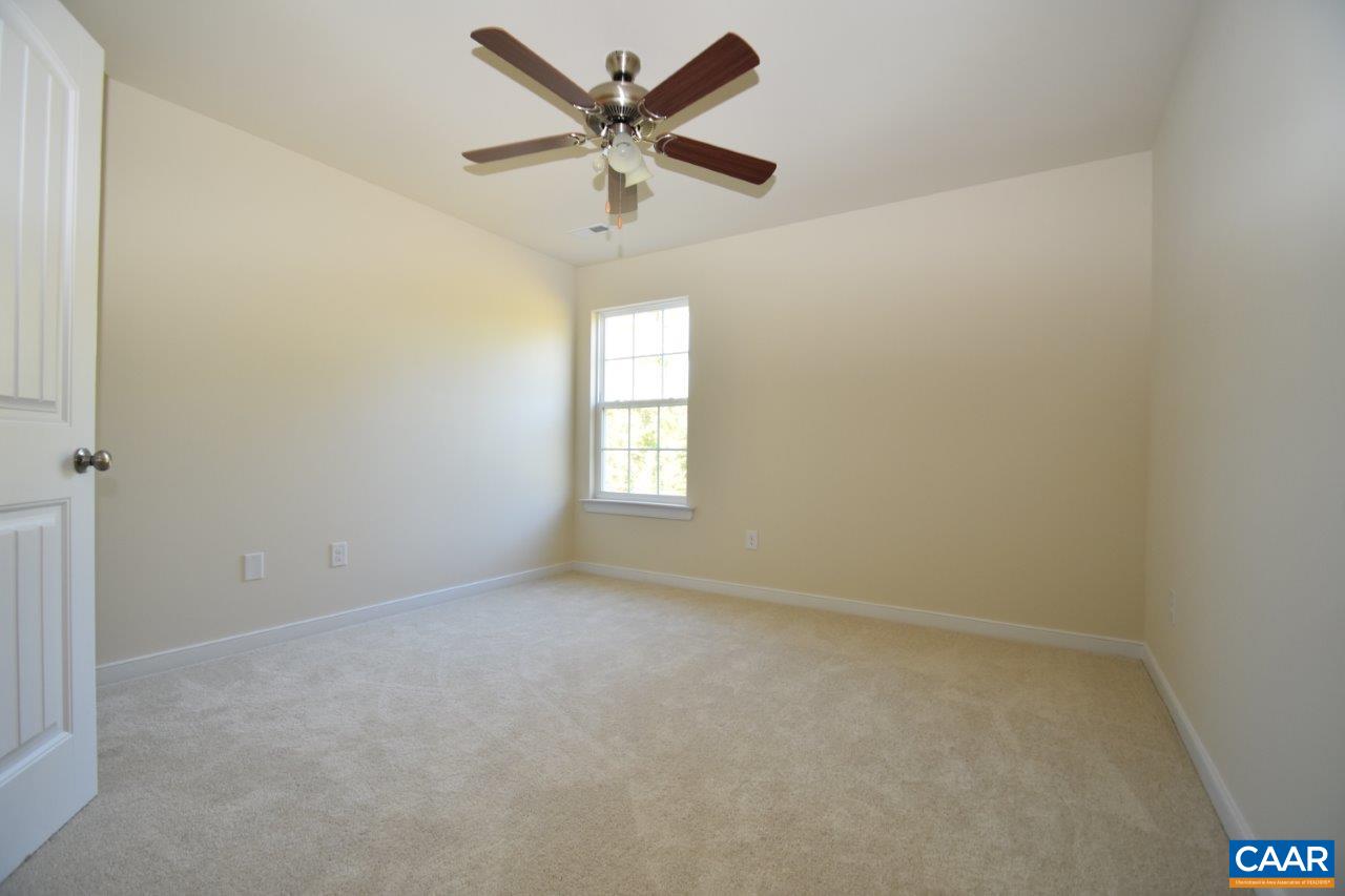 87 Riva Way Palmyra, VA 22963 - Photo 14 of 19 an empty room with a window and a fan