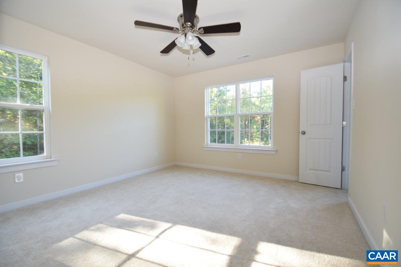 87 Riva Way Palmyra, VA 22963 - Photo 17 of 19 a view of an empty room with a window