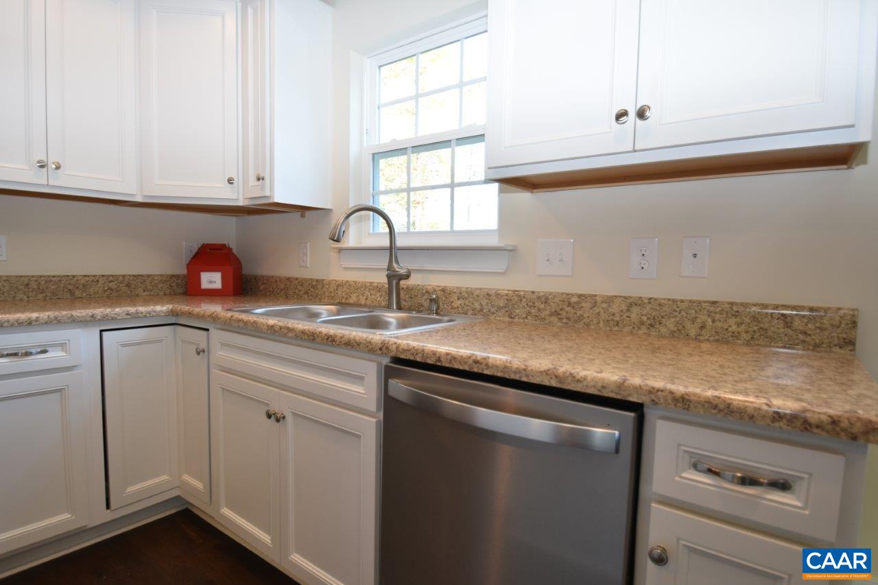 87 Riva Way Palmyra, VA 22963 - Photo 7 of 19 a kitchen with a sink and cabinets