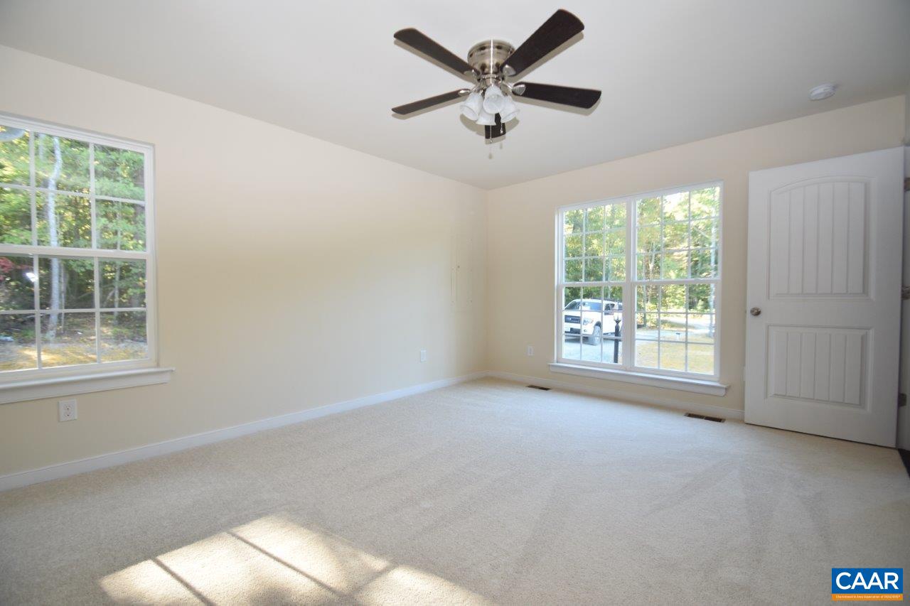 87 Riva Way Palmyra, VA 22963 - Photo 10 of 19 a view of an empty room with a window