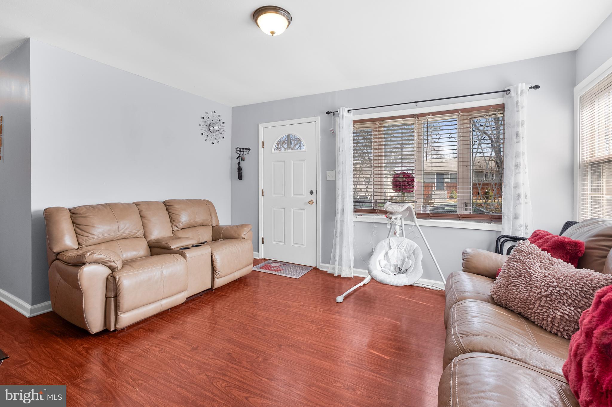 2208 Virginia Avenue Landover, MD 20785 - Photo 3 of 17 a living room with furniture and a large window