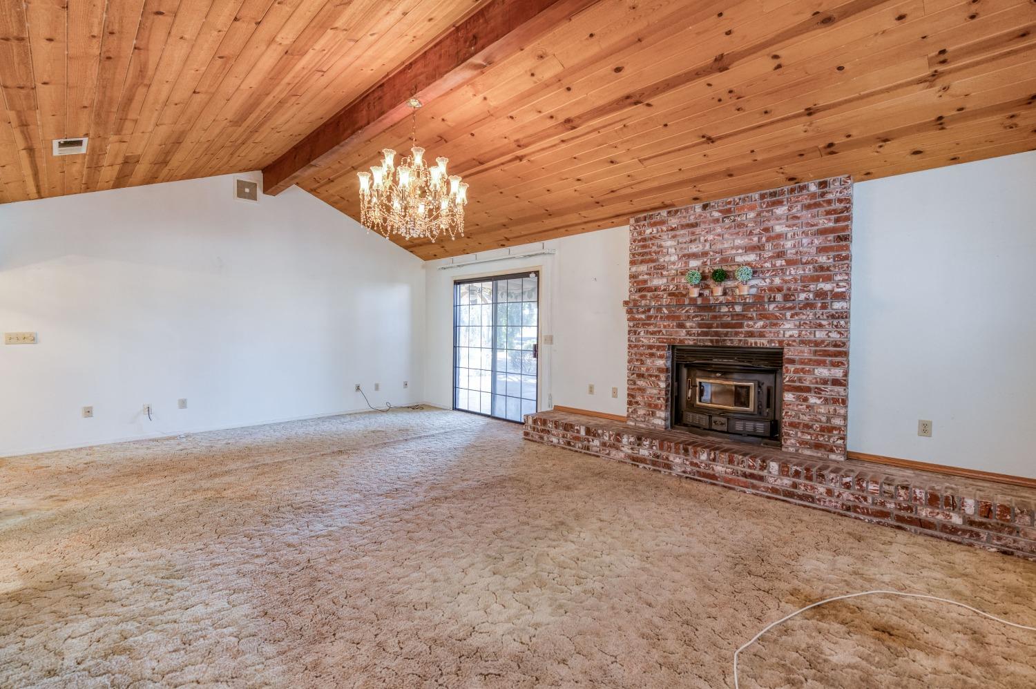 19650 Road 31 Madera, CA 93638 - Photo 8 of 43 a view of empty room with a fireplace