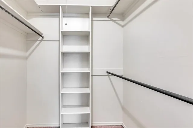 a view of a house with swimming pool and sitting area