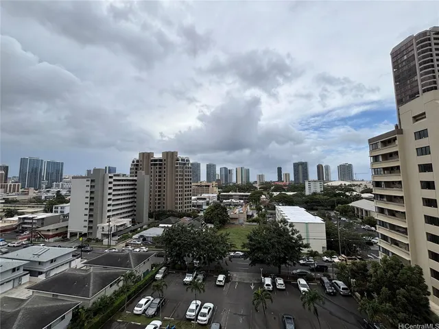 a view of a city with tall buildings