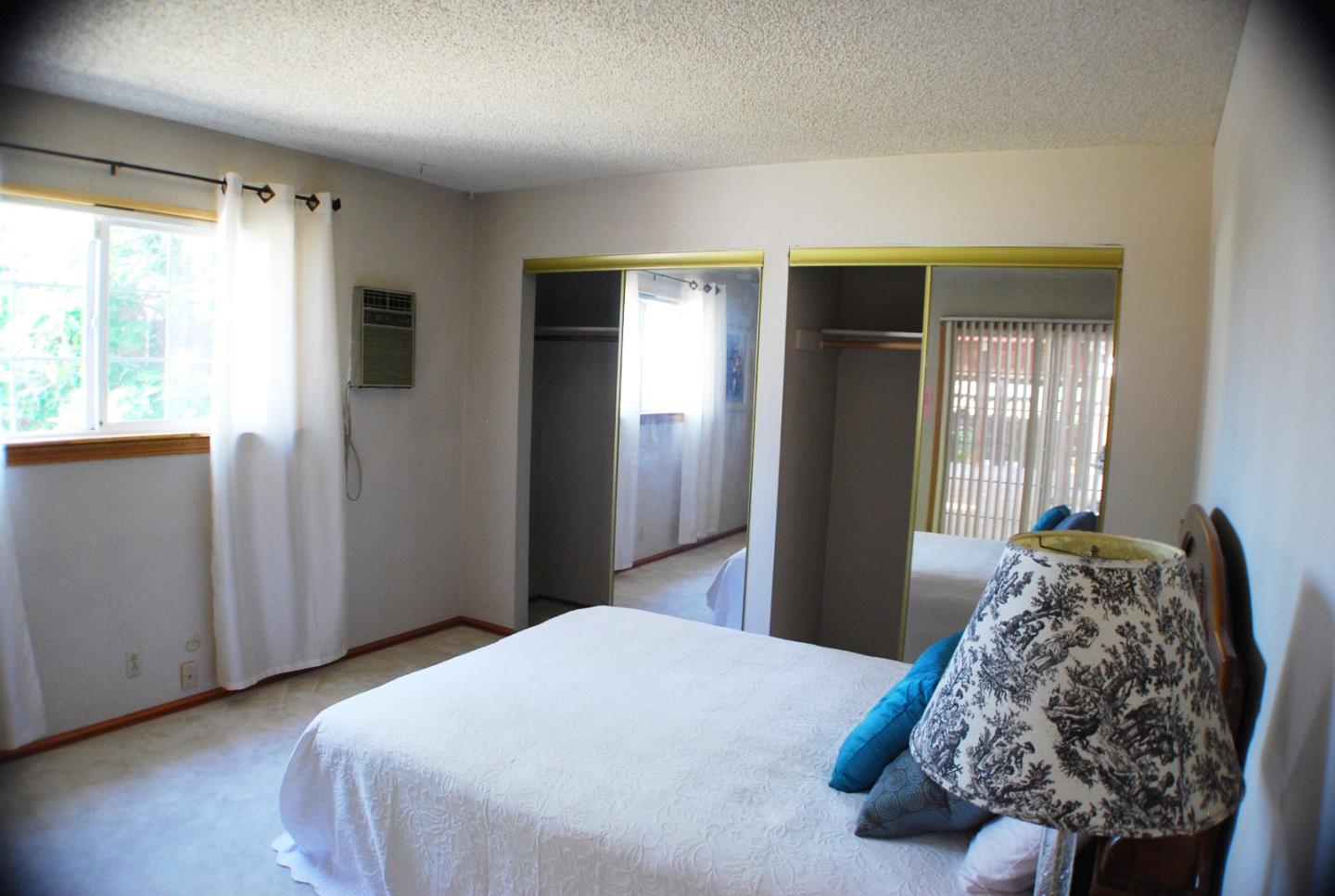 3381 Tully Road San Jose, CA 95148 - Photo 11 of 17 a bedroom with a bed and wooden floor