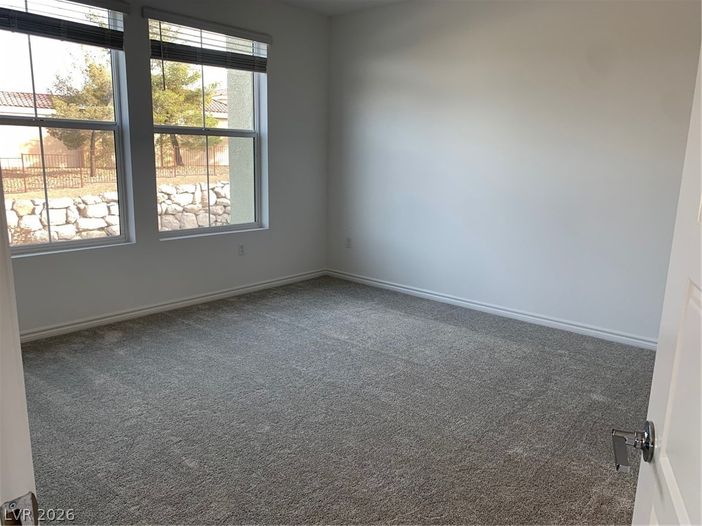 2555 Hampton Road, Unit 7109 Henderson, NV 89052 - Photo 24 of 34 Two large windows provide ample illumination to this room, offering views of the outdoors.