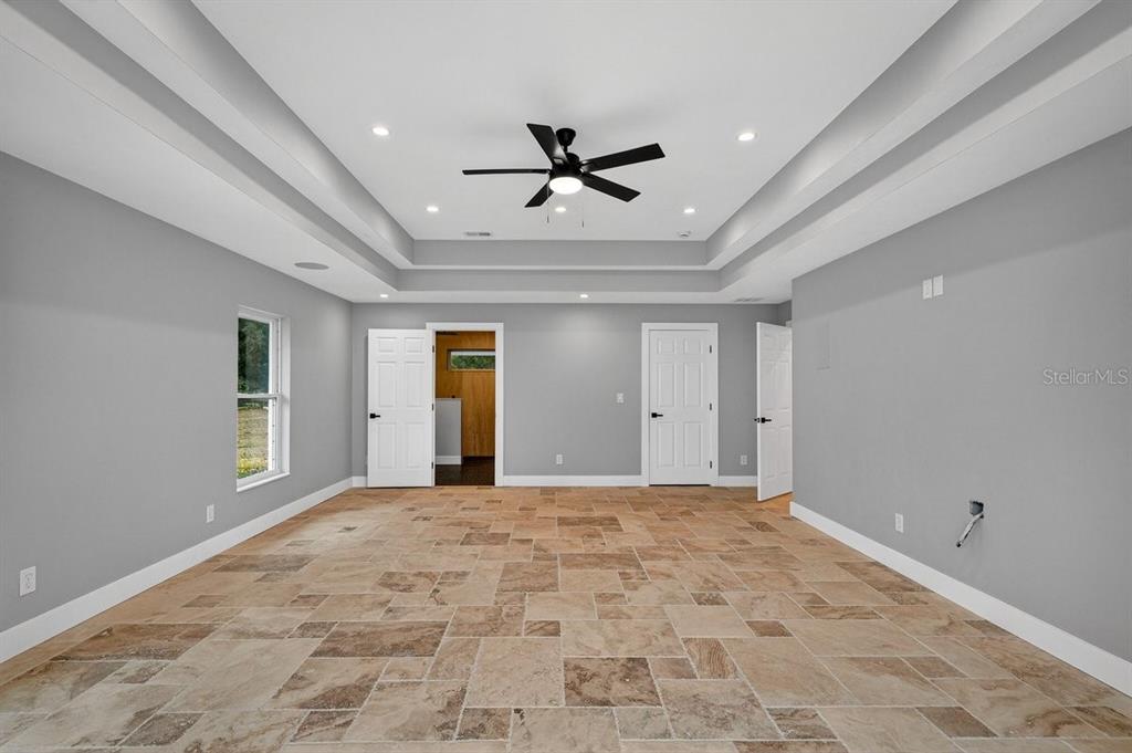 720 Pringle Road Port Orange, FL 32127 - Photo 11 of 68 a view of a livingroom with a ceiling fan and window