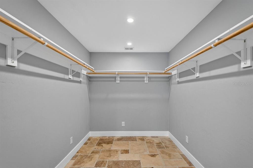 720 Pringle Road Port Orange, FL 32127 - Photo 12 of 68 a view of a room with racks on the wall