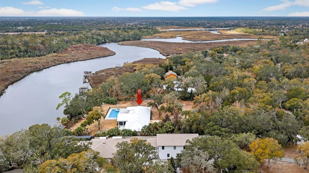 720 Pringle Road Port Orange, FL 32127 - Photo 17 of 68 a view of a lake with a mountain