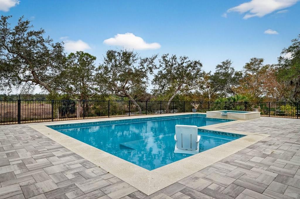 720 Pringle Road Port Orange, FL 32127 - Photo 34 of 68 a view of swimming pool with a yard