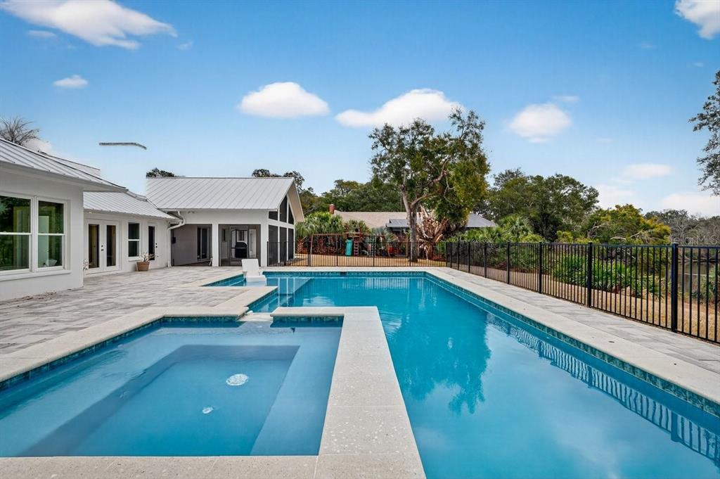 720 Pringle Road Port Orange, FL 32127 - Photo 36 of 68 a view of house with swimming pool outdoor seating