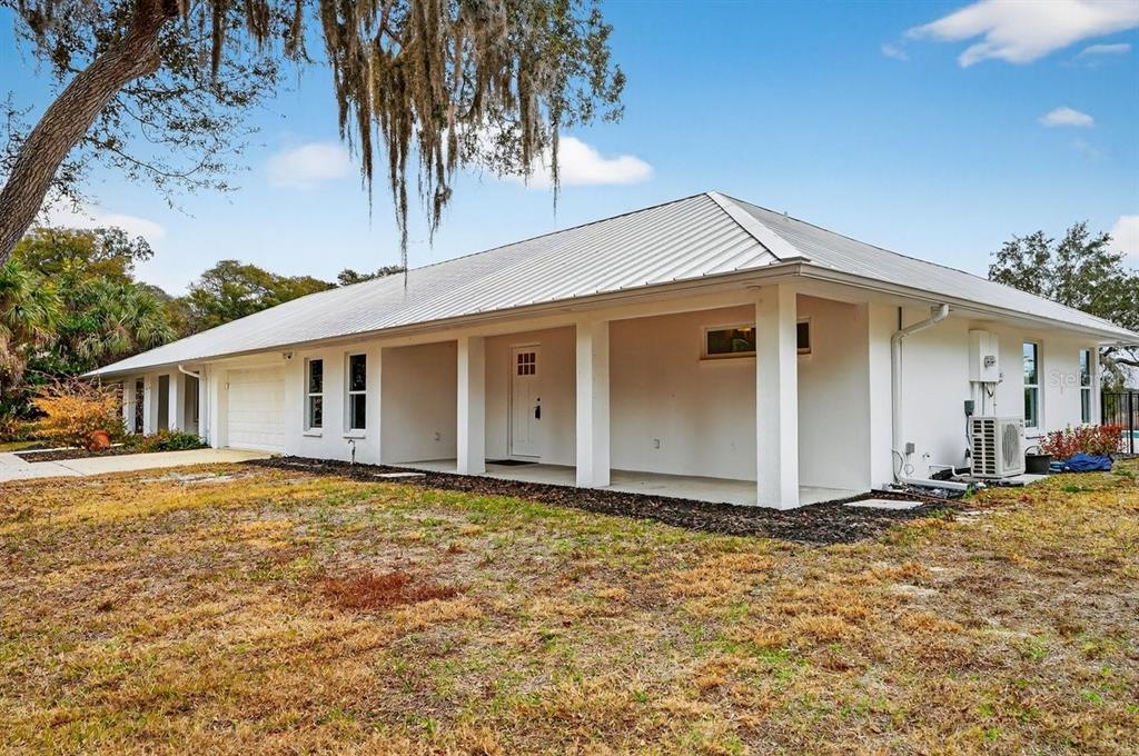 720 Pringle Road Port Orange, FL 32127 - Photo 37 of 68 a view of a house with backyard