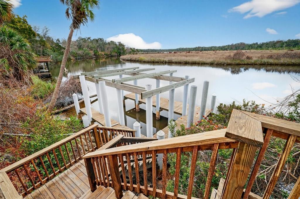 720 Pringle Road Port Orange, FL 32127 - Photo 4 of 68 a view of a lake from a balcony