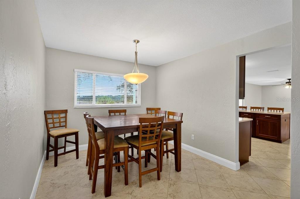 720 Pringle Road Port Orange, FL 32127 - Photo 48 of 68 a view of a dining room with furniture