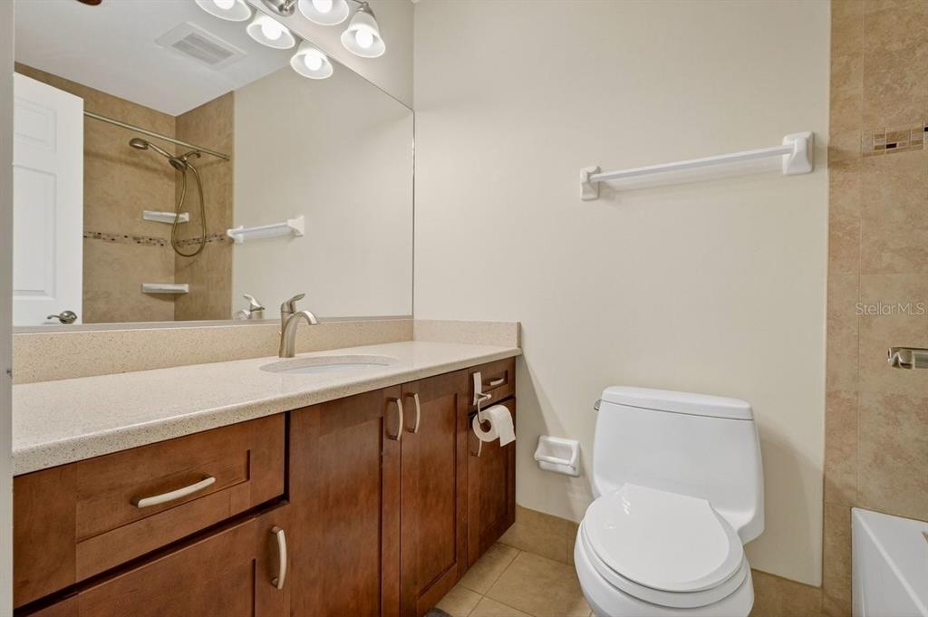 720 Pringle Road Port Orange, FL 32127 - Photo 55 of 68 a bathroom with a sink a toilet a mirror and shower