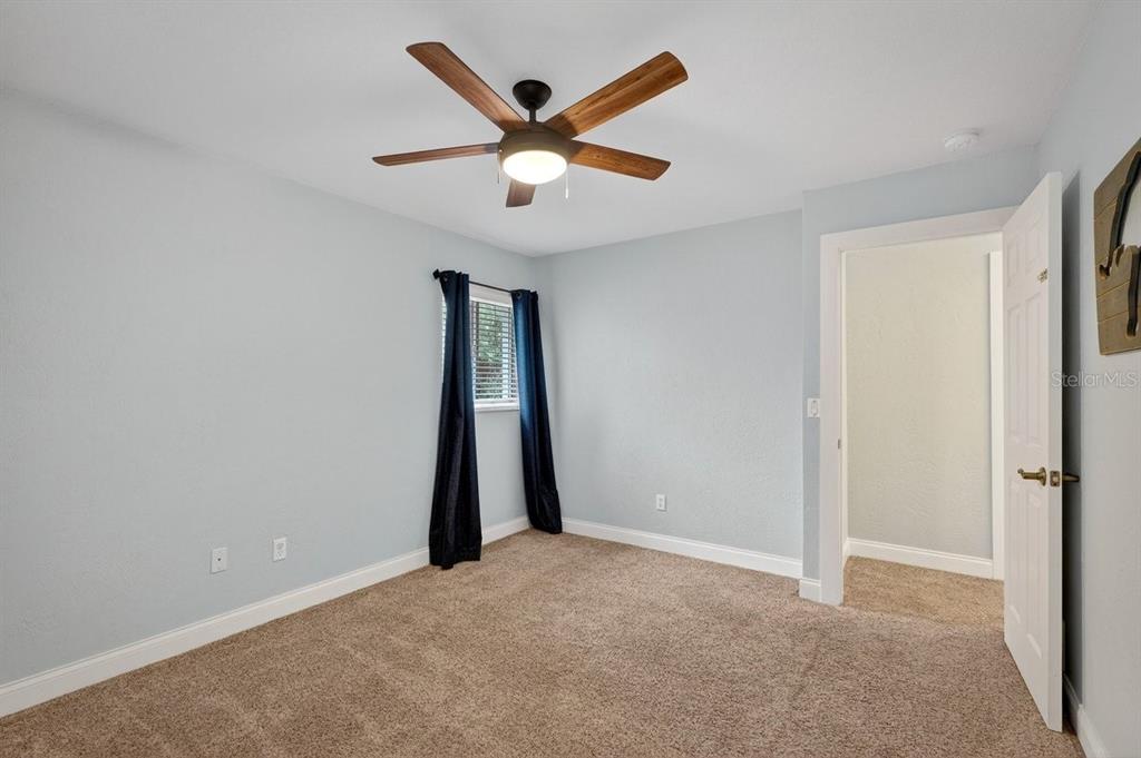 720 Pringle Road Port Orange, FL 32127 - Photo 63 of 68 an empty room with closet and windows