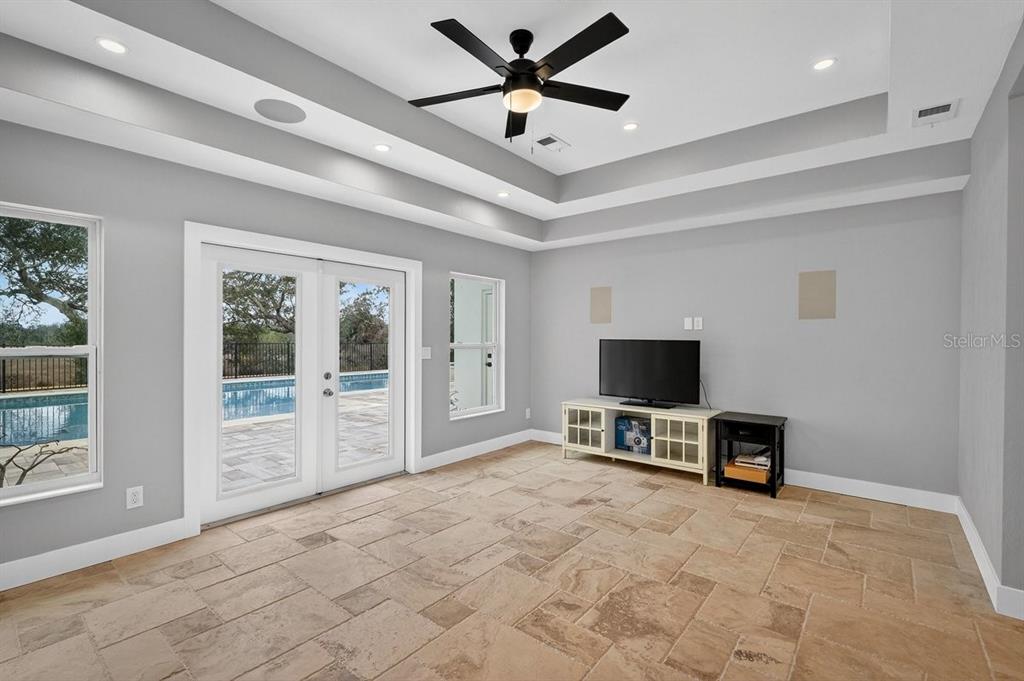 720 Pringle Road Port Orange, FL 32127 - Photo 7 of 68 a living room with furniture and a flat screen tv