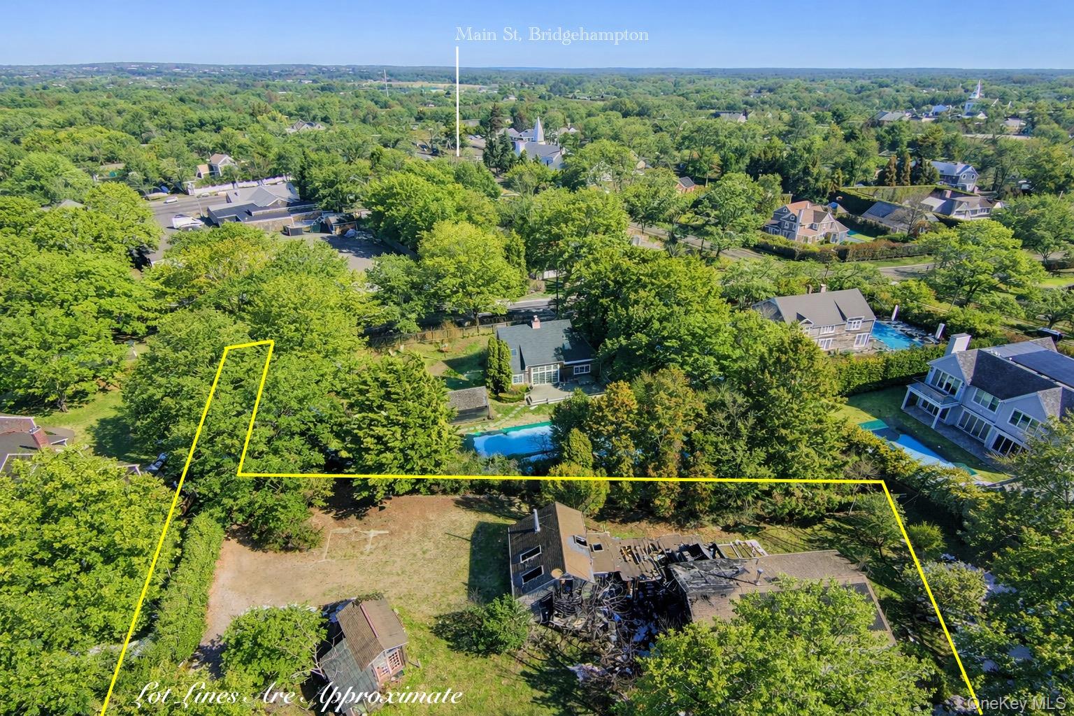 81 Hildreth Lane Bridgehampton, NY 11932 - Photo 3 of 5 an aerial view of a house with a yard