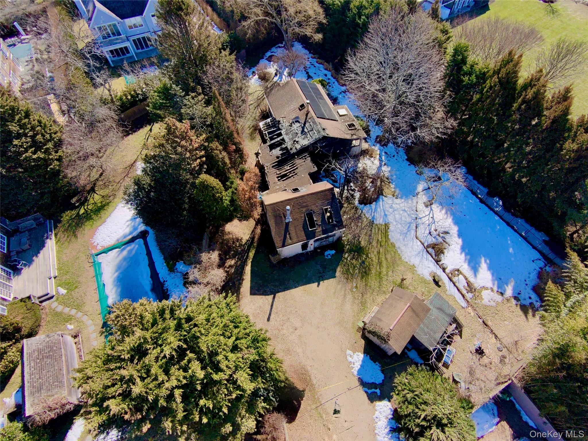 81 Hildreth Lane Bridgehampton, NY 11932 - Photo 5 of 5 an aerial view of a house with a yard