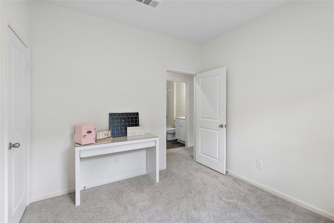 3626 Addington Ct. Huffman, TX 77336 - Photo 18 of 26 a room with a table and a chair