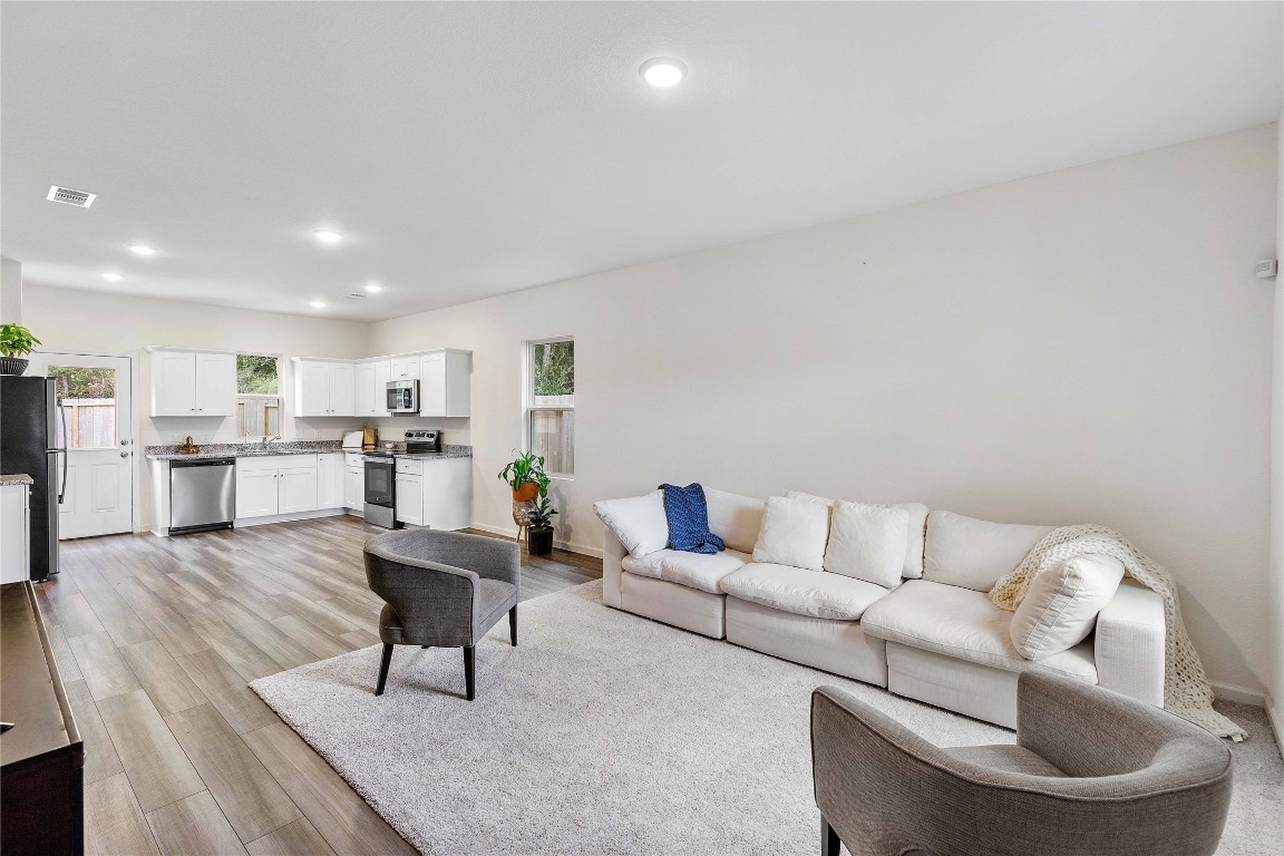 3626 Addington Ct. Huffman, TX 77336 - Photo 6 of 26 a living room with furniture and a table