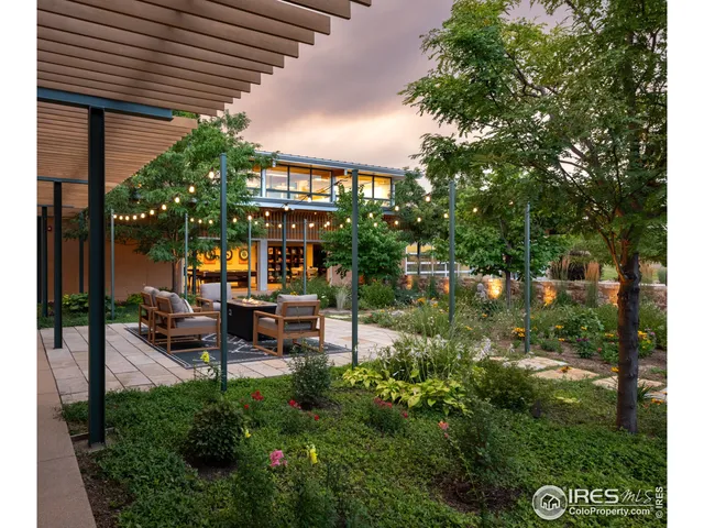 a view of chairs and tables in the patio
