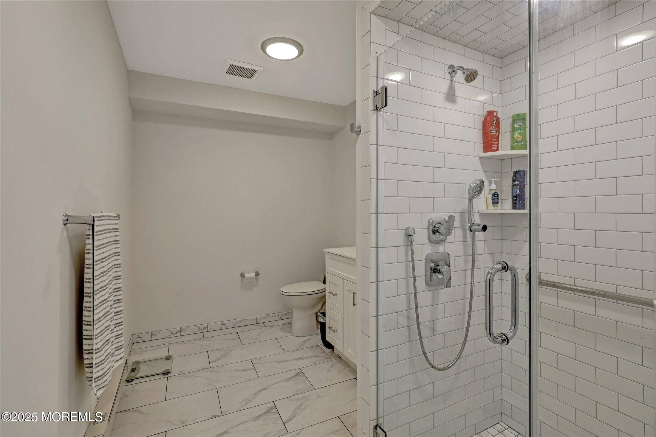 55 Brighton Avenue, Unit 4 Long Branch, NJ 07740 - Photo 13 of 33 a bathroom with a shower