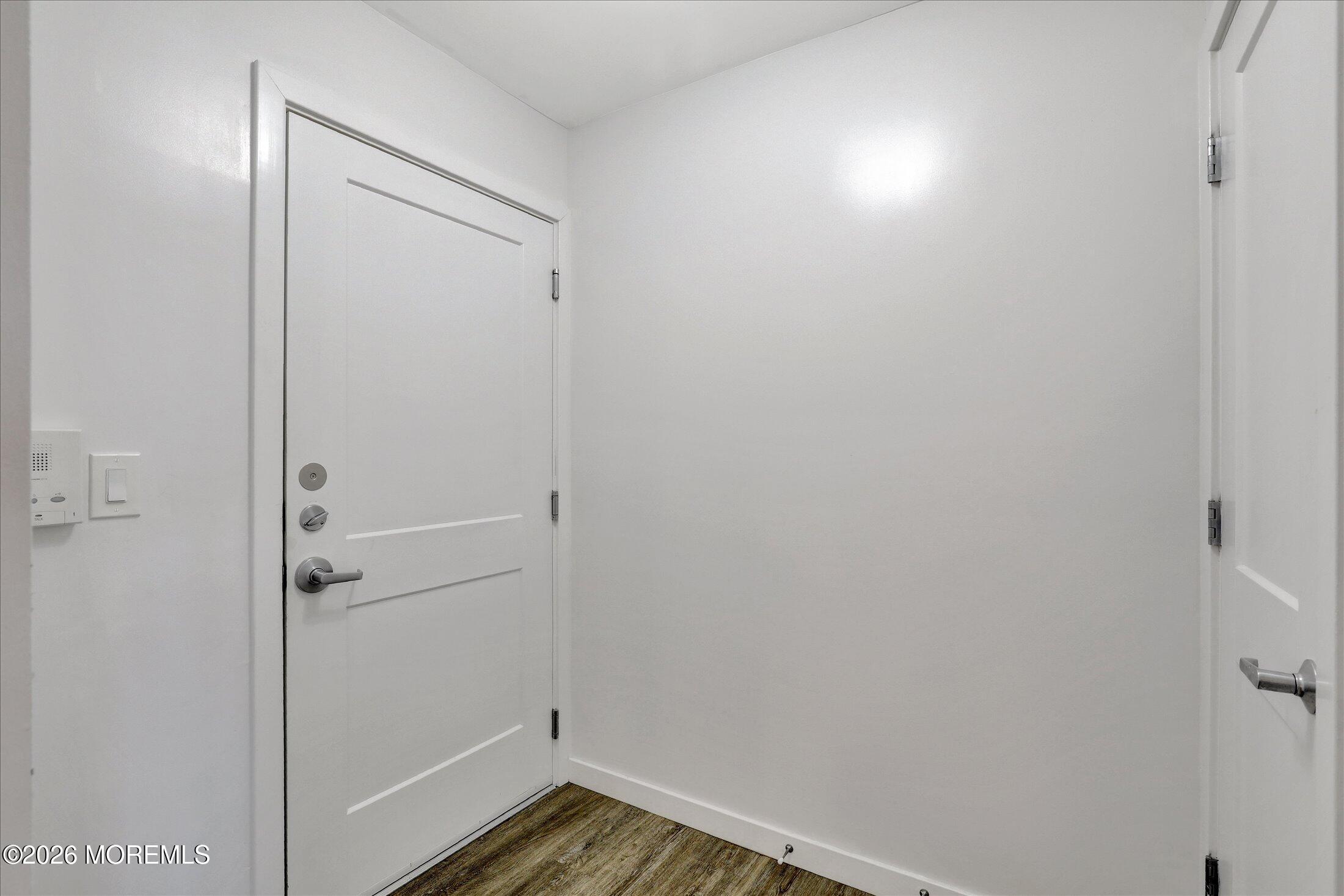 55 Brighton Avenue, Unit 4 Long Branch, NJ 07740 - Photo 8 of 36 a view of a room with wooden floor