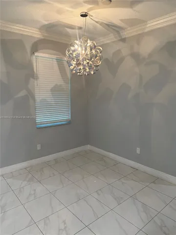 a view of a chandelier in a room