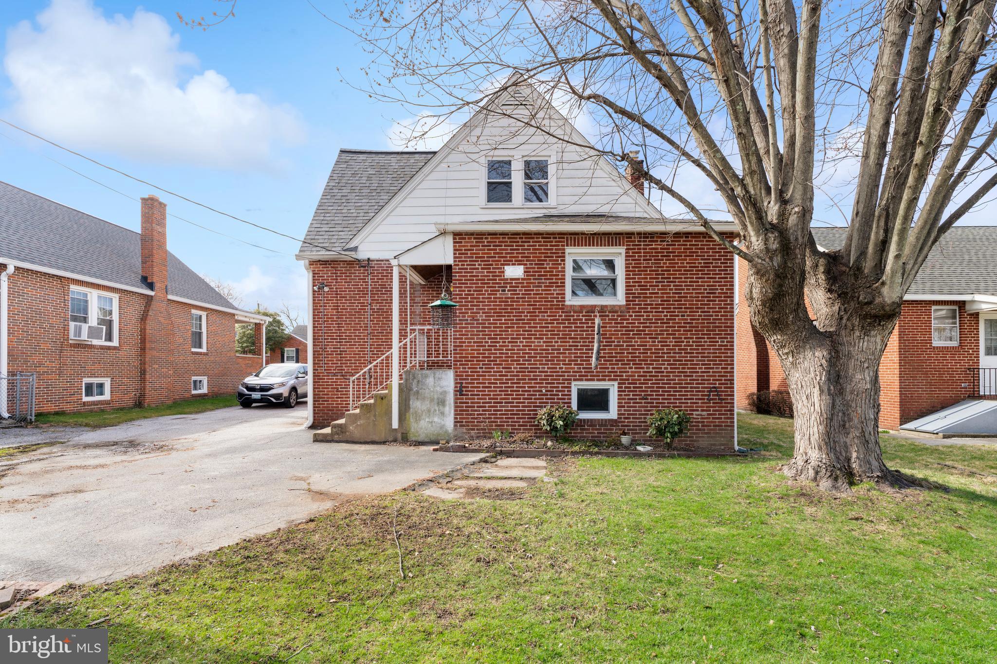 2718 Alden Road Baltimore, MD 21234 - Photo 32 of 39 a front view of a house with a yard