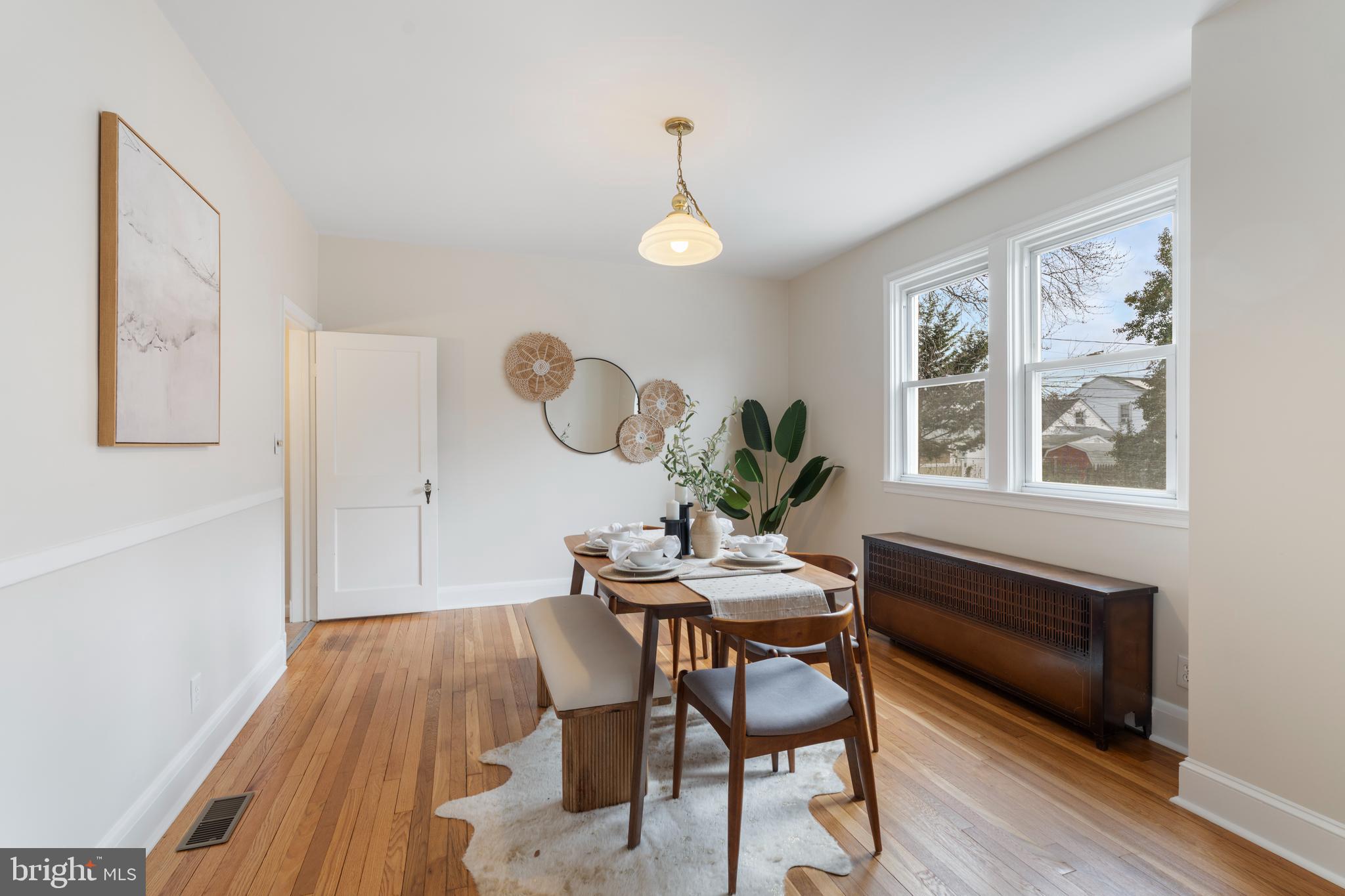 2718 Alden Road Baltimore, MD 21234 - Photo 4 of 39 a view of a dining room with furniture window and wooden floor