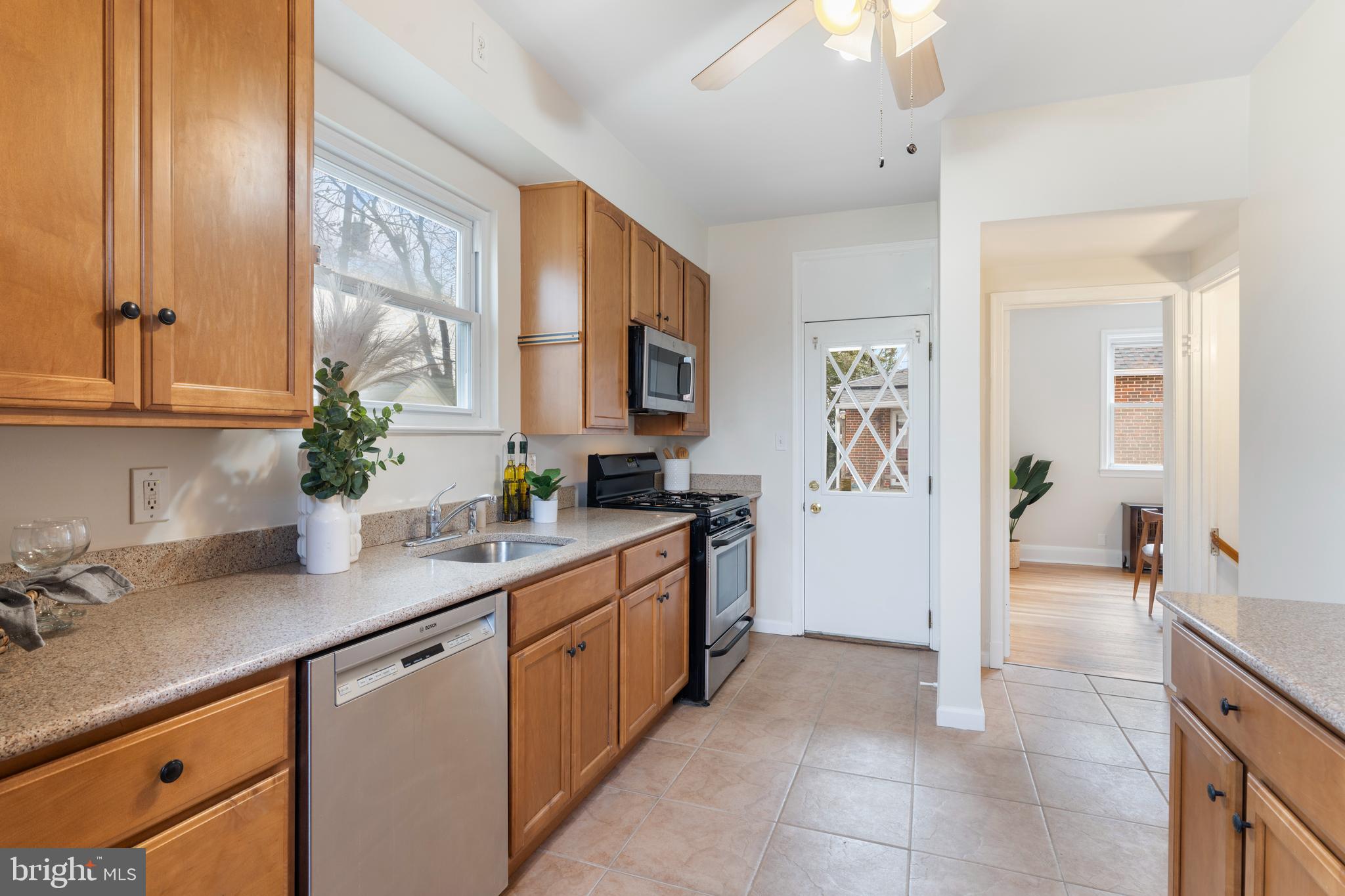 2718 Alden Road Baltimore, MD 21234 - Photo 5 of 39 a kitchen with a sink and cabinets