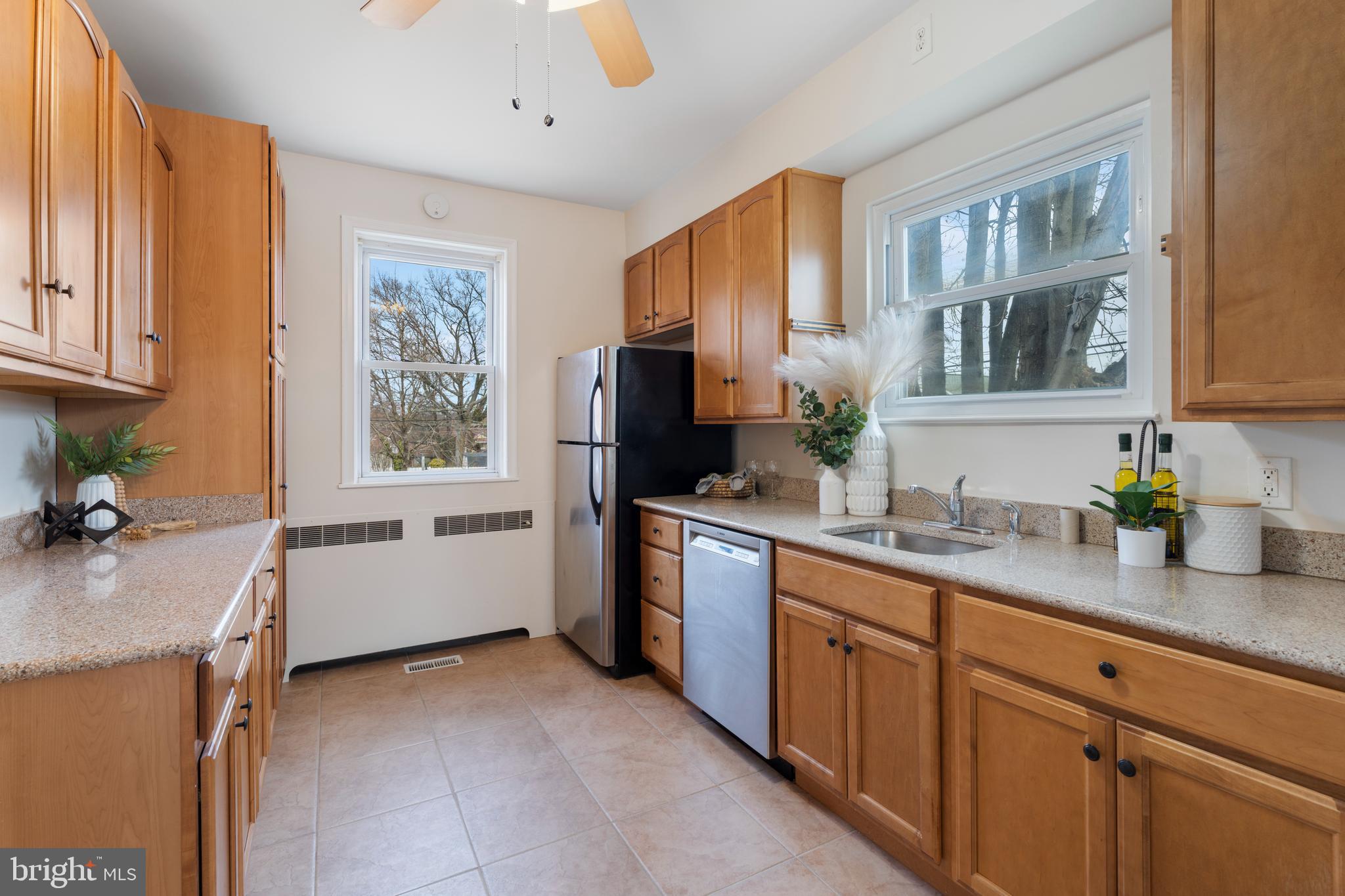 2718 Alden Road Baltimore, MD 21234 - Photo 6 of 39 a kitchen with a refrigerator and a sink