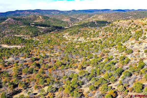 a view of a field with an outdoor space