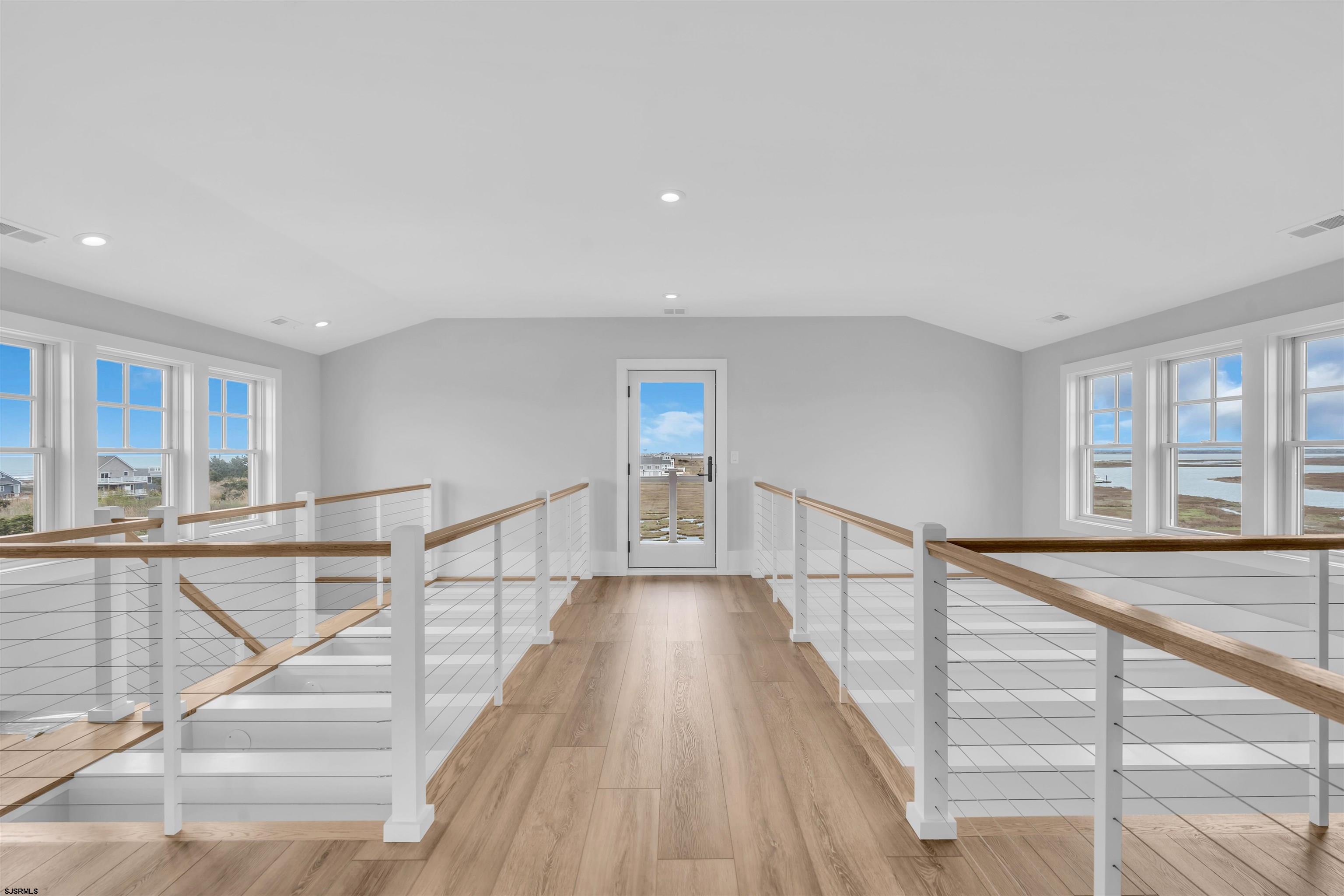 117 Taylor Avenue Strathmere, NJ 08248 - Photo 48 of 70 a view of entryway and hall with wooden floor