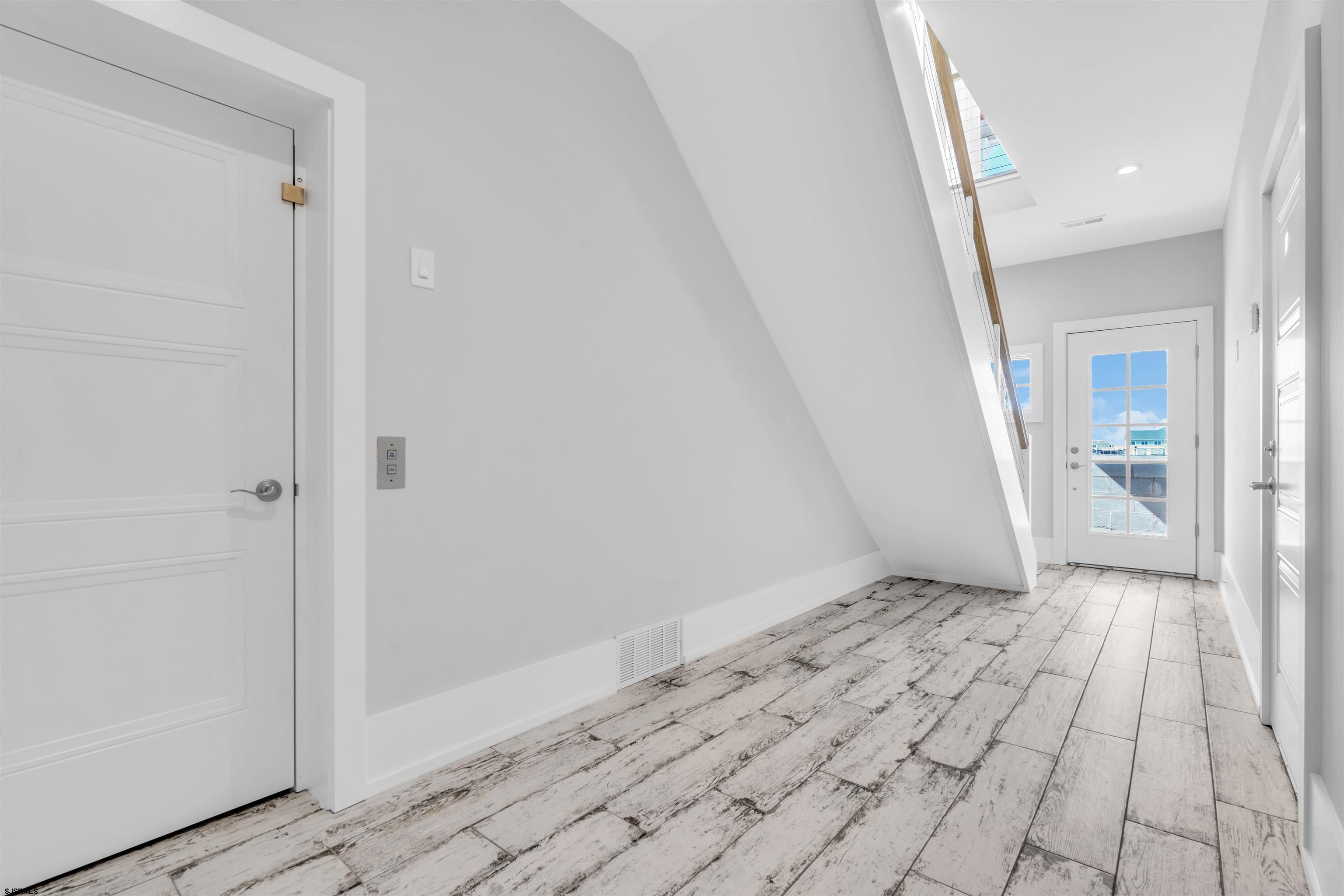 117 Taylor Avenue Strathmere, NJ 08248 - Photo 5 of 70 a view of an empty room