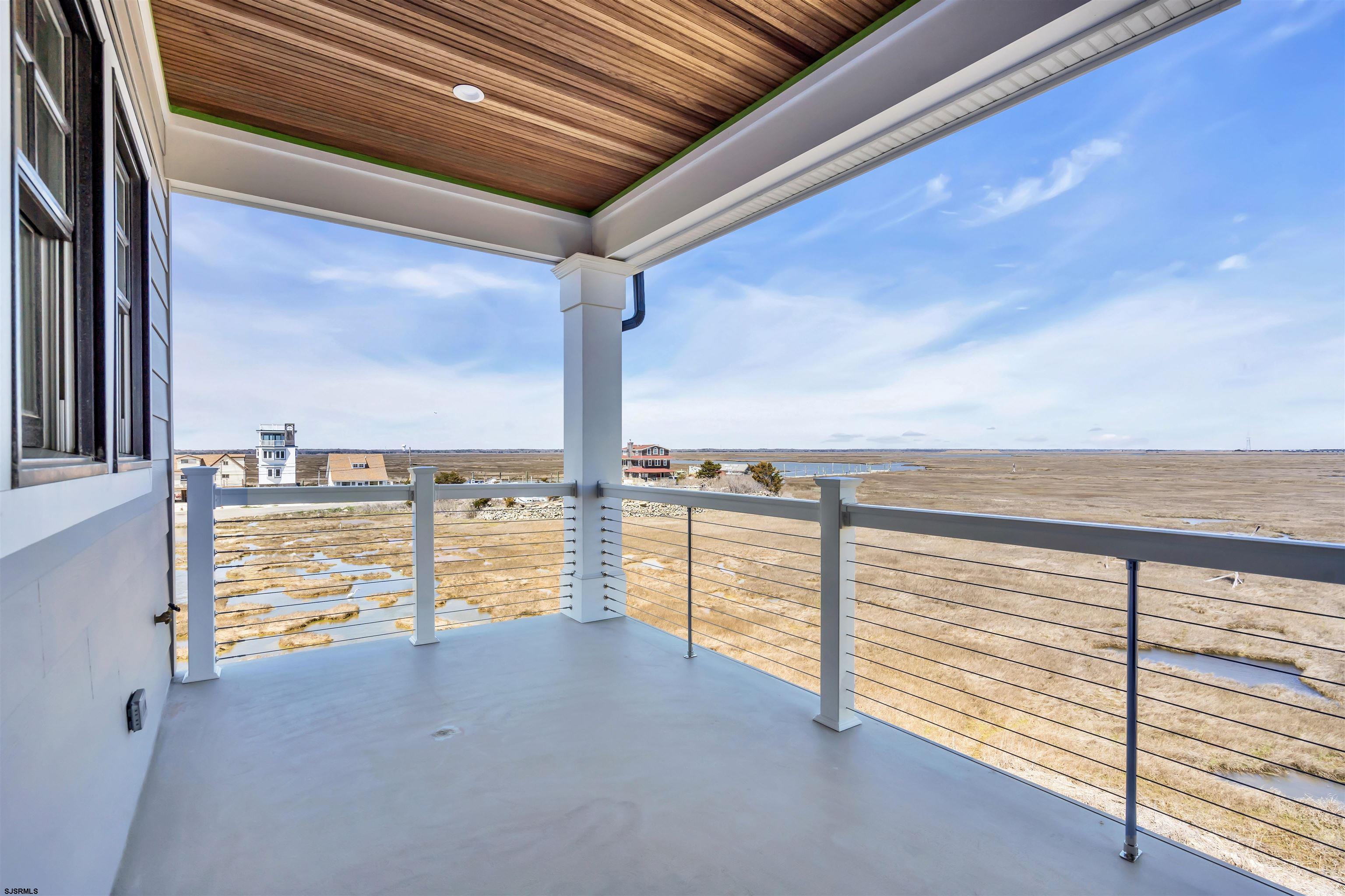 117 Taylor Avenue Strathmere, NJ 08248 - Photo 56 of 70 a view of ocean from a balcony